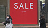 A massive sale sign is set up in front of a department store in downtown Seoul on Sunday. The four major department store chains — Lotte, Shinsegae, Hyundai and Galleria — started their first sales of the year on Sunday, with some discounts as high as 70 percent. The sales event will run through Jan. 16. [YONHAP]