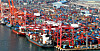 Cargo loaded up on a vessel headed overseas at a port in Busan on Tuesday. The OECD on Tuesday released a revised outlook that slightly lowered Korea's GDP growth for this year. It projected the Korean economy to contract 1.1 percent. In September that contraction was at 1 percent. [YONHAP]