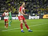 Bayern Munich's Harry Kane celebrates after he scored his third goal during a Bundesliga match against Borussia Dortmund in Dortmund, Germany on Saturday. [AP/YONHAP]