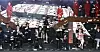 The cast of “Money Heist: Korea – Joint Economic Area” grab bills falling from the money shower at the press event hosted by Netflix Korea at Coex in southern Seoul on Wednesday. [NEWS1]