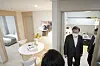 President Moon Jae-in looks around a well-decorated 280-square-foot public apartment in Dongtan, Gyeonggi, last week. [KIM SEONG-RYONG]