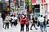 The government announced Wednesday that people who have had their first vaccine shot will be allowed to take off their masks outdoors starting in July. In addition, it announced the lifting of restrictions on gatherings for vaccinated people. In the photo, people are walking in Myeongdong in central Seoul with their masks on Wednesday. [NEWS1]