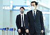 Industry Minister Lee Chang-yang arrives at Incheon International Airport, west of Seoul, to leave for the United States on Tuesday. [YONHAP]