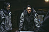 Kim Woo-bin plays 5-8, a deliveryman who supplies ordinary people with oxygen and necessities for survival, in an apocalyptic dystopia in Netflix series ″Black Knight″ [NETFLIX]