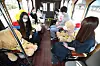 Stuffed dolls are placed on every other seat of a tour bus in Daegu Wednesday to guarantee social distancing among passengers. [YONHAP]