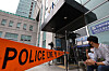 Reporters wait outside the Seongbuk Police Precinct in central Seoul Sunday, where aides to the late Seoul Mayor Park Won-soon were summoned for questioning. [NEWS1]