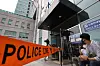 Reporters wait outside the Seongbuk Police Precinct in central Seoul Sunday, where aides to the late Seoul Mayor Park Won-soon were summoned for questioning. [NEWS1]