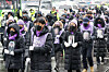 The families of the victims of the 2022 Itaewon disaster, holding portraits of their loved ones, silently march down Sejong-daero in central Seoul on Wednesday, calling for the swift enactment of the Itaewon Disaster Special Act and the establishment of an independent investigation body to probe the incident. They later headed toward the presidential office in Yongsan District, central Seoul. [NEWS1]
