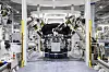 Robots carry and assemble cars at the Hyundai Motor Group Global Innovation Center in Singapore. [HYUNDAI MOTOR GROUP]