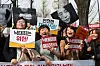 Abortion rights activists celebrate the Constitutional Court's decision on April 11, 2019, at the court's gates in central Seoul. The Constitutional Court ruled Act 269 of the current Criminal Act, also known as the abortion law, as unconstitutional for the first time in 66 years. [YONHAP]