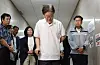 Democratic Party leader Lee Jae-myung, center, heads into his office during a hunger strike at the National Assembly in Yeouido, western Seoul, Monday. [JOINT PRESS CORPS]