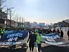 Families of the victims of the Itaewon crowd crush and other participants march on a street in central Seoul on Saturday. [YONHAP]