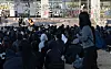 Sungshin Women's University students sit on the university's field on Friday as they wait for the protest to start. [NEWS]