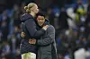 Manchester City's Erling Haaland, left, hugs Wolverhampton Wanderers' Hwang Hee-chan after a Premier League match at the Etihad Stadium in Manchester on Sunday. [AP/YONHAP]