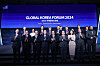 Dignitaries, including former UN Secretary-General Ban Ki-moon, center left in front row, pose for a photo at the Global Korea Forum at the Lotte Hotel in central Seoul on Tuesday. [MINISTRY OF UNIFICATION]