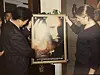 Former general manager Park Hyo-sung of Warner Bros Korea, left, takes a look at the poster of 'The Interview with the Vampire' in 1994, with lead actor Tom Cruise, right, when the movie came to Korea for the first time. [PARK HYO-SUNG]