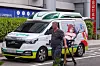 A patient is carried by a medical worker at a general hospital in Seoul on Wednesday. [YONHAP]