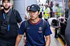 Lee Kang-in, center, arrives at Gimhae International Airport in Busan with his Paris Saint-Germain teammates on Wednesday ahead of a Coupang Play Series preseason friendly against K League club Jeonbuk Hyundai Motors on Thursday. [COUPANG PLAY]
