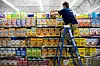 FILE―An employee stocks the shelves in the cereal aisle of a Walmart store in Fayetteville, Ark., on Oct. 12, 2016. Breakfast cereals, a heavily marketed, highly processed mainstay of the American diet, especially among children, are becoming less healthy, filled with increasing amounts of sugar, fat and sodium, according to a study published Wednesday, May 21, 2025, in the journal JAMA Network Open. (Melissa Lukenbaugh/The New York Times)