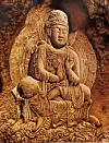 Kim's reproduction of a cultural heritage 'Rock-carved Bodhisattva' at Sinseonam Hermitage using nakhwa technique [PARK SANG-MOON]