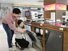 Models show off Lotte Hi-Mart's dishwashers. [LOTTE HI-MART]