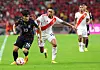 Korea's Lee Kang-in, left, dribbles the ball during a friendly against Peru at Busan Asiad Stadium in Busan on Friday. [YONHAP]