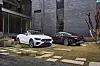 Mercedes-Benz’s New E-Class Cabriolet, left, and E 450 4MATIC Coupe are on display. The automaker said Tuesday that it has launched two Coupe models and one Cabriolet. [MERCEDES-BENZ KOREA]