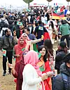 Foreign students, some wearing their home countries' traditional clothes, participate in the 'Ajou International Day' parade at Ajou University in Suwon, Gyeonggi, on Thursday. [YONHAP]