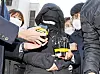 Jeong-in's adopted mother leaves the Seoul Southern District Court after a detention warrant hearing on Nov. 11, 2020. [YONHAP]