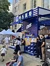 People look around the Cass booth on Monday. [JIM BULLEY]