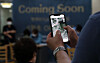 A person searches for clinics with left-over Covid-19 shots on his mobile app through a reservation system launched on Thursday, in Seodaemun District, western Seoul. [NEWS1]