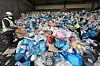 Workers sort recyclable waste at a sorting facility in Dobong District, northern Seoul, on Jan. 26. The Seoul Metropolitan Government has launched a campaign to encourage residents to reduce household waste by 10 liters (2.6 gallons) per person over the next two years, or one trash bag annually. If all 10 million residents participate, the city estimates the effort will reduce waste by about 60 tons per day, and about 44,000 tons of household waste over two years in preparation for a nationwide ban on dumping garbage in landfills. [NEWS1]
