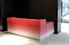 Designer Park Won-min’s bright red ombre information desk is made of resin. [SEOUL MUSEUM OF CRAFT ART]