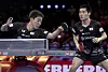 Lim Jong-hoon, left, and Jang Woo-jin compete during the men's doubles final match against Sweden's Kristian Karlsson and Mattias Falck at the 2021 World Table Tennis Championships Finals in Houston, Texas, on Monday. [XINHUA/YONHAP]