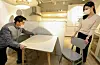 Hyundai Livart workers deliver a table. [HYUNDAI LIVART]