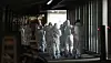 Health officials enter the Seoul Dongbu Detention Center in Songpa District, southern Seoul, Saturday, where at least 202 people have tested positive for the coronavirus. Former President Lee Myung-bak, who’s serving a 17-year sentence there, tested negative. [NEWS1]