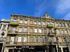 An apartment in Vilnius shows several Ukrainian flags hung across balconies on Feb. 9. [ESTHER CHUNG]
