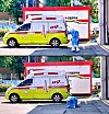 A medical professional sinks to the floor Sunday due to dehydration near a fire station in Jeonju, North Jeolla, as health authorities reported a new five-month high of daily coronavirus cases. [YONHAP]
