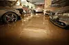 Cars are covered in mud in an underground parking lot in Seongnam, Gyeonggi on Wednesday due to the heavy rainfall that took place last week. [NEWS1]