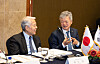 Lee In-ho, executive vice chairman of the Korea International Trade Association, right, and Yutaka Aso, chairman of Aso Cement, discuss potential economic cooperation at the Korea-Japan New Industrial Trade Conference in Lotte Hotel in central Seoul on March 13. [KITA]