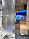 In Ader Error's new store, each changing room has unexpected surprises. In the photo, a changing room is a noraebang singing room. [ADER ERROR]