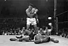 In this May 25, 1965, file photo, Muhammad Ali stands over Sonny Liston after knocking Liston down during their heavyweight championship bout in Lewiston, Maine. [AP/YONHAP]