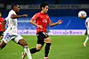 Real Madrid's Rodrygo challenges Real Mallorca's Lee Kang-in during a La Liga match at the Santiago Bernabeu stadium in Madrid on Wednesday. [AFP/YONHAP]