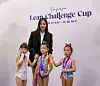 Son Yeon-jae, center, poses for a photo with junior rhythmic gymnasts during the Leap Challenge Cup at Namdong Gymnasium in Incheon on Dec. 18, 2022. [NEXT YOUPHORIA]