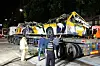 Police move a city bus, destroyed by a collapsed building in Gwangju, on Thursday. Nine passengers on the bus were killed and eight others were seriously inured when a building collapsed and fell on top of it on Wednesday. [YONHAP]