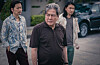 Actor Choi Min-sik, center, as Cha Mu-sik in 'Big Bet' [DISNEY+]