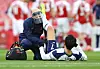 Tottenham Hotspur's Son Heung-min receives medical attention after sustaining an injury against Arsenal at Emirates Stadium in London on Sunday. [REUTERS/YONHAP]
