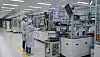 Workers at a Daeyang Electric production line in Incheon manage the production automotive pressure sensor on Aug. 20. [JEON TAE-GYU]