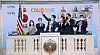 Coupang Chief Executive Officer Kim Bom-suk, third from left, celebrates the successful initial public offering of the e-commerce company on Thursday. [NEWS1]