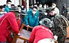 President Yoon Suk-yeol, center, helps move fallen furniture at Ocheon Market in Pohang, North Gyeongsang, amid typhoon recovery efforts on Wednesday. [JOINT PRESS CORPS]